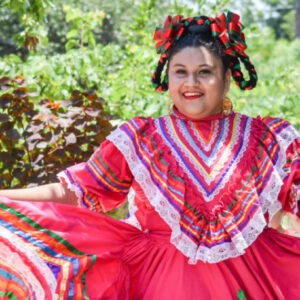 Colorfully attired folkorico dancer at Viva Botanica.
